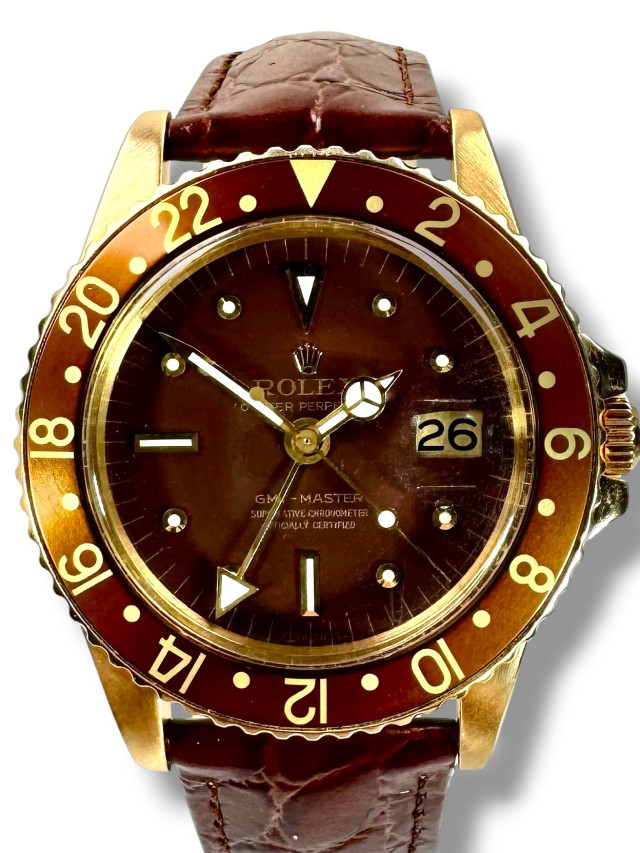Vintage Rolex GMT Master 1675 18KT Gold Double Papers