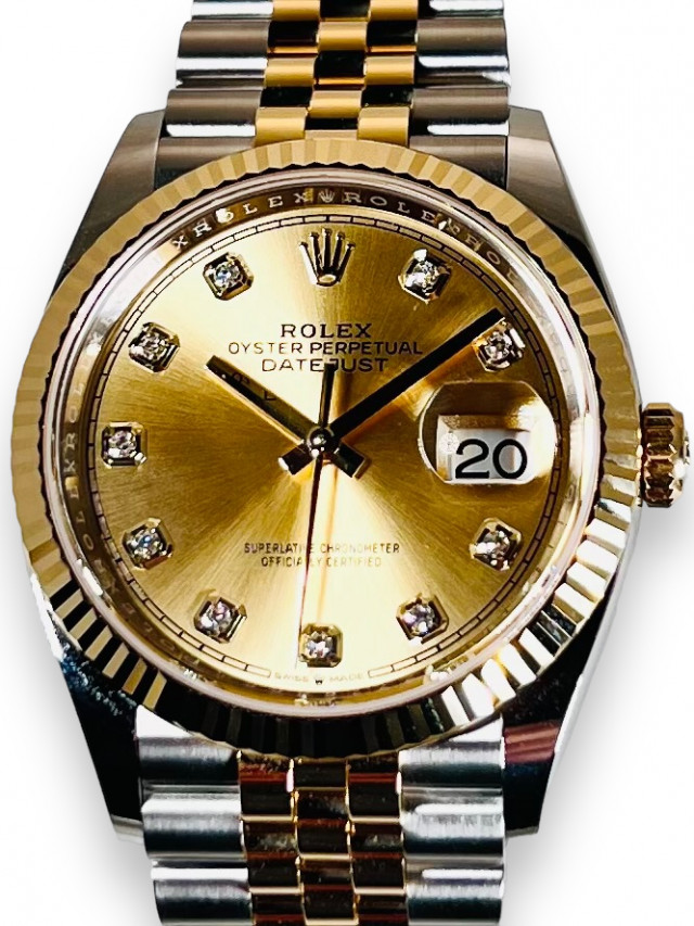 Unworn  Rolex Datejust 126233 Yellow Gold & Steel